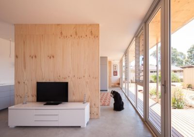 Breezway Louvres next to fixed glass and doors help frame a view whilst still allowing air into the home