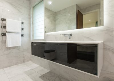 Elegant bathroom with marple stone and Breezway louvres