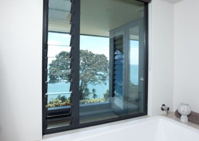 Enjoy uninterrupted views out onto bay with Breezway fixed lite combination