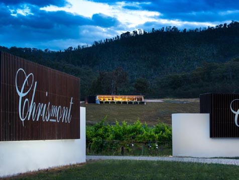 Entry to chrismont with building in background Entry to chrismont with building in background