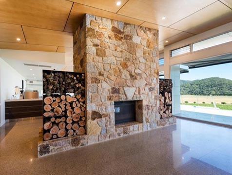 Featured fireplace with Breezway louvres in the distance Featured fireplace with Breezway louvres in the distance