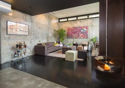 Indoor lounge with Breezway louvres up high