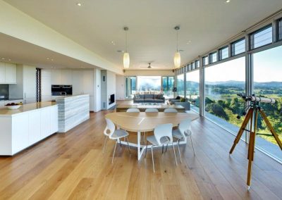 Living room and kitchen with Breezway Louvres