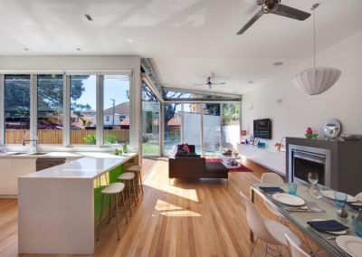 Manfredini Coogee kitchen and living room naturally ventilated with Breezway Louvres