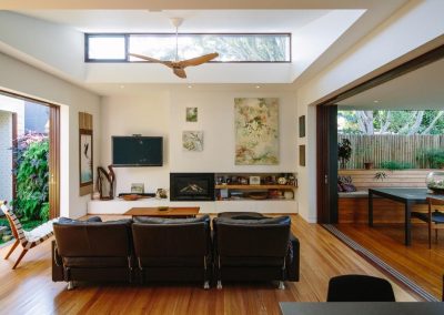 Lounge room with high level Breezway louvre next to fixed glass