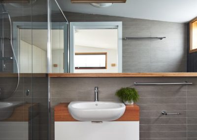 Modern bathroom with timber highlights