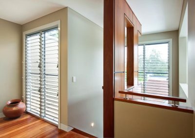 Multiple bays of Breezway Louvres in the staircase to help light and ventilate small areas