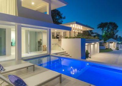 Outdoor view onto pool from Plantation House