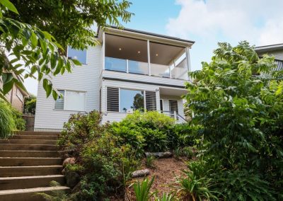 Property on sloping land at red hill with Breezway louvres in full view