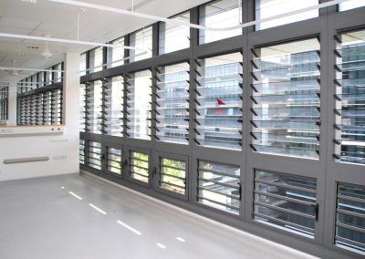 Wall of Breezway louvre windows open for natural ventilation