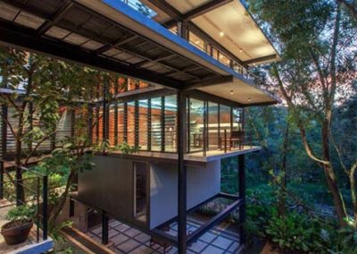 Residential Home Thriving on Lush but Challenging Environment