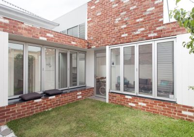 Exterior of home with Breezway Louvres