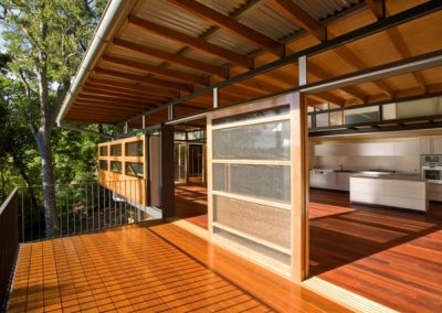 Balcony and kitchen of hilltop home