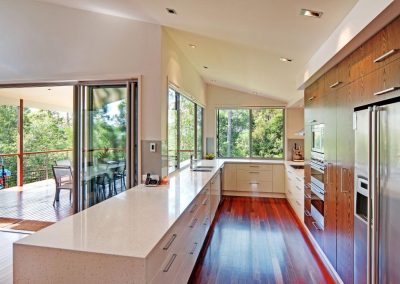 View of kitchen out onto balcony