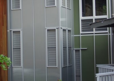 Exterior of apartment with multiple Breezway louvres
